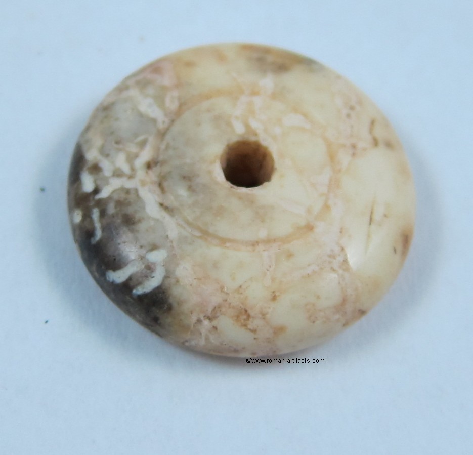 Bone spindle whorl